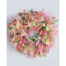 Corona de flores deshidratadas en tonos Rosas